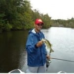 Sergeant Marcos Rivera of New York, NY proudly boats his first bass